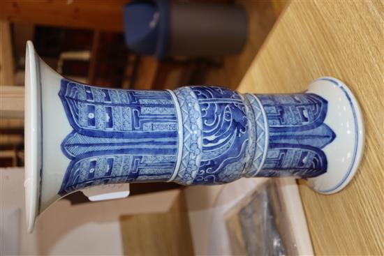 A Chinese blue and white beaker vase, Gu Kangxi mark but later H.34cm
